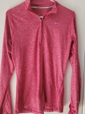 Nike Women's Long Sleeve Half-Zip Top in heathered pink with gray hue undertones